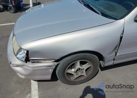 1998 Toyota Avalon Xls z USA, uszkodzony, nr VIN 4T1BF18B0WU235448